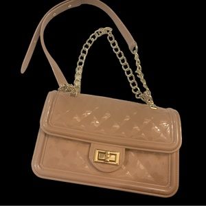 Beige quilted turn lock bag